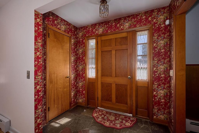 152 Bart Dr, Poughkeepsie, NY 12603 - entrance foyer featuring a baseboard radiator, wallpapered walls, and a baseboard heating unit