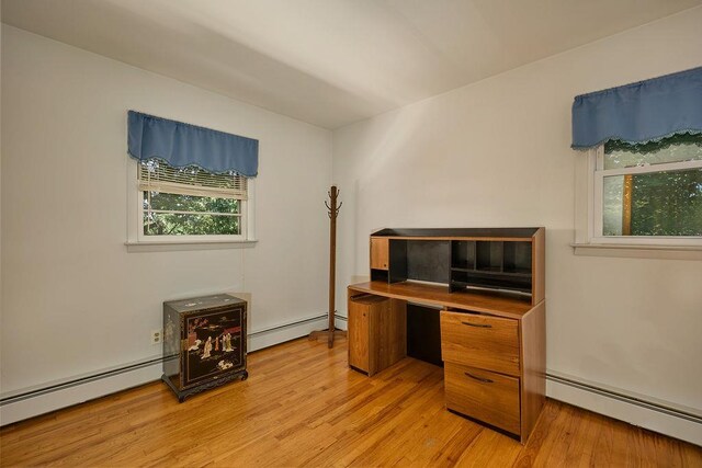 152 Bart Dr, Poughkeepsie, NY 12603 - home office with baseboard heating and light wood-type flooring