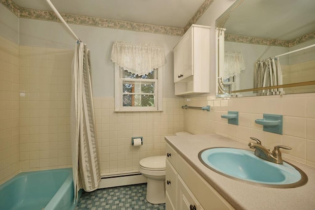 152 Bart Dr, Poughkeepsie, NY 12603 - full bathroom with baseboard heating, vanity, tile walls, shower / bath combo, and wainscoting