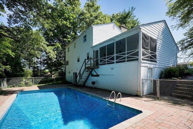 152 Bart Dr, Poughkeepsie, NY 12603 - view of swimming pool featuring a sunroom, stairs, and a patio