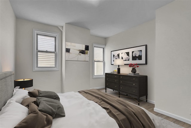 58-60 78th Ave, Glendale, NY 11385 - bedroom with wood finished floors and baseboards