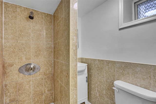 58-60 78th Ave, Glendale, NY 11385 - full bathroom with a tile shower, vanity, wainscoting, and tile walls