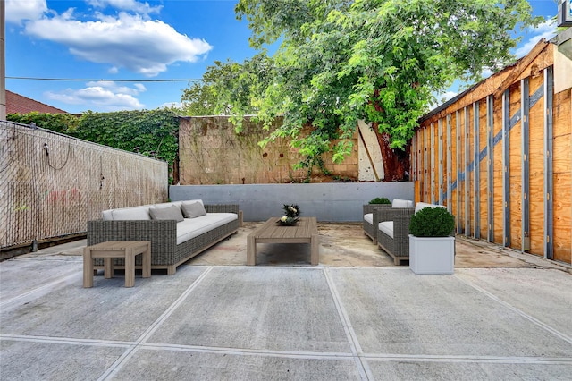 58-60 78th Ave, Glendale, NY 11385 - fenced backyard with an outdoor living space and a patio area