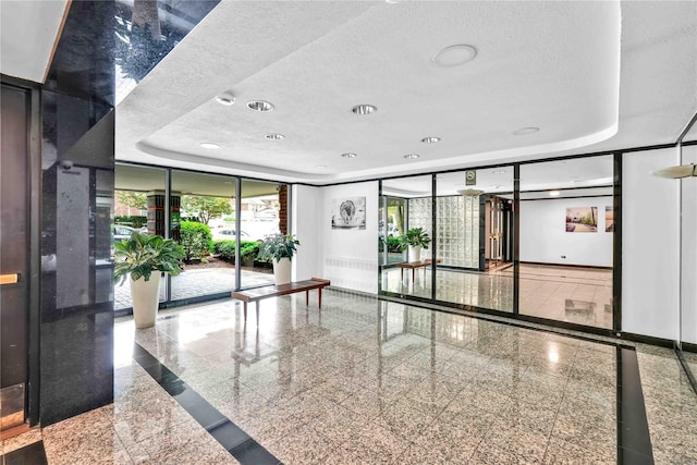 209-10 41st Ave Unit 2J, Bayside, NY 11361 - common area with recessed lighting, a textured ceiling, and expansive windows