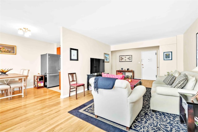 209-10 41st Ave Unit 2J, Bayside, NY 11361 - living area featuring light wood-style flooring