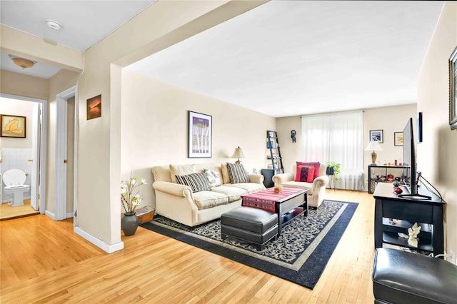 209-10 41st Ave Unit 2J, Bayside, NY 11361 - living area featuring hardwood / wood-style flooring and baseboards