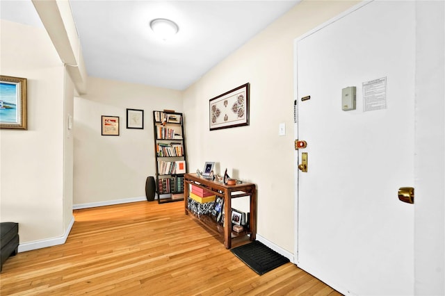 209-10 41st Ave Unit 2J, Bayside, NY 11361 - hall featuring light wood-type flooring and baseboards