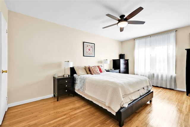 209-10 41st Ave Unit 2J, Bayside, NY 11361 - bedroom with light wood finished floors and ceiling fan