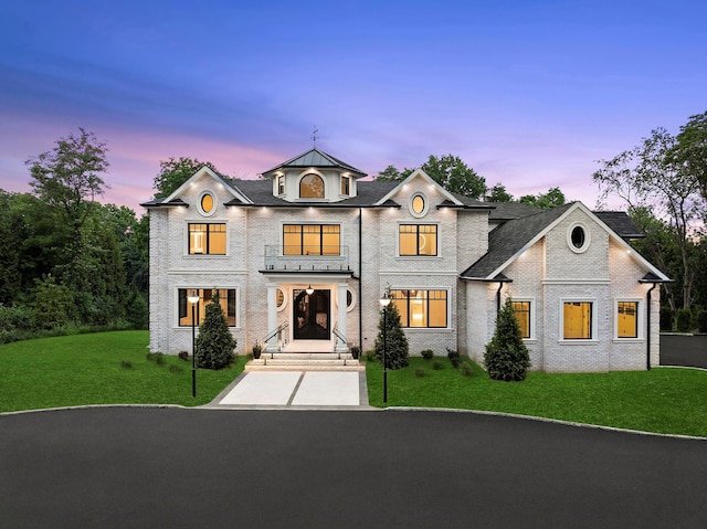 26 Saint Andrews Ct, Old Westbury, NY 11568 - french country home featuring a yard