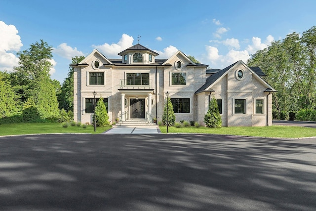26 Saint Andrews Ct, Old Westbury, NY 11568 - french country home with a front yard