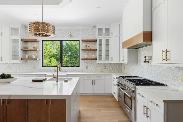 26 Saint Andrews Ct, Old Westbury, NY 11568 - kitchen featuring range with two ovens, open shelves, custom exhaust hood, and light stone counters