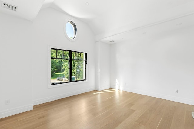 26 Saint Andrews Ct, Old Westbury, NY 11568 - unfurnished room featuring light wood-type flooring and high vaulted ceiling