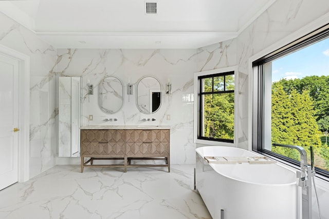 26 Saint Andrews Ct, Old Westbury, NY 11568 - bathroom with marble tiled flooring, a soaking tub, and double vanity