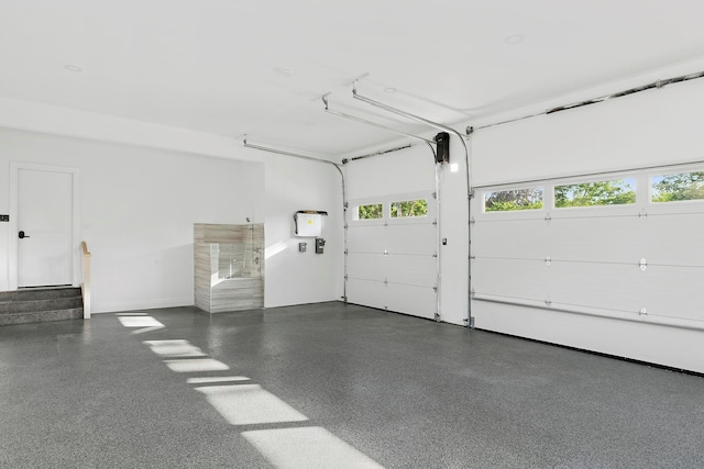 26 Saint Andrews Ct, Old Westbury, NY 11568 - garage with baseboards