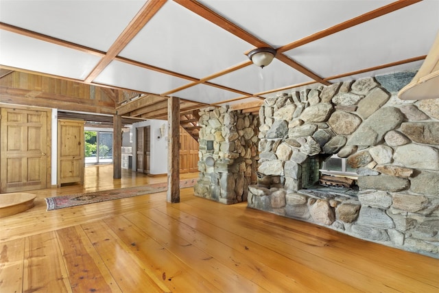 880 W Mill Rd, Mattituck, NY 11952 - unfurnished living room with a fireplace, wood-type flooring, and wood walls