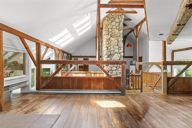 880 W Mill Rd, Mattituck, NY 11952 - additional living space with lofted ceiling, hardwood / wood-style floors, and a skylight