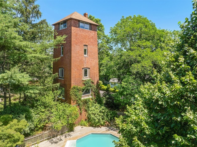 880 W Mill Rd, Mattituck, NY 11952 - view of home's exterior with a chimney