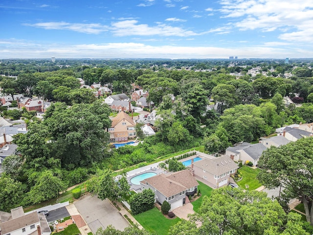 5 Pickett Ct, Malverne, NY 11565 - aerial overview of property's location featuring a pool area and nearby suburban area