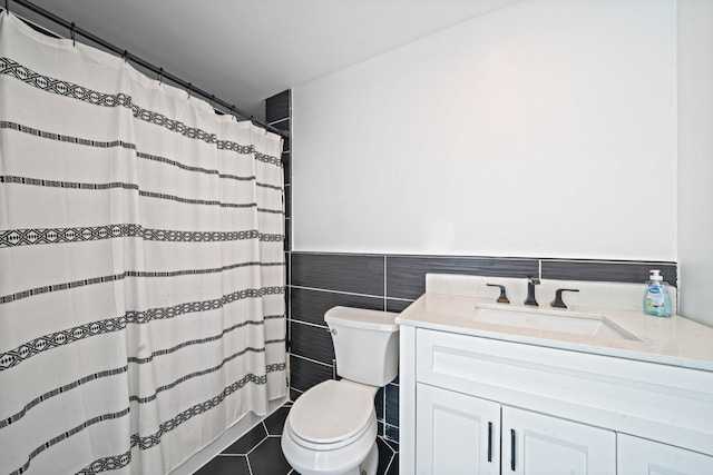 5 Pickett Ct, Malverne, NY 11565 - full bath with tile walls, vanity, tile patterned flooring, wainscoting, and a shower with curtain