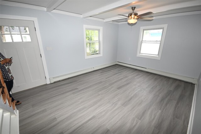 67 Maplewood Dr, Westbury, NY 11590 - foyer with beam ceiling, wood finished floors, baseboard heating, a baseboard heating unit, and a ceiling fan