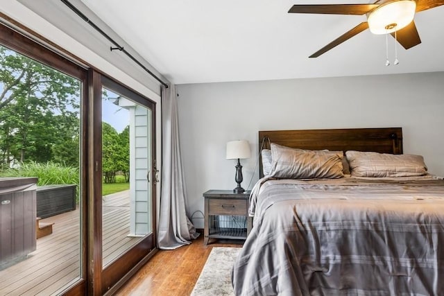 11065 Old Sound Ave, Mattituck, NY 11952 - bedroom with access to exterior, wood finished floors, and ceiling fan