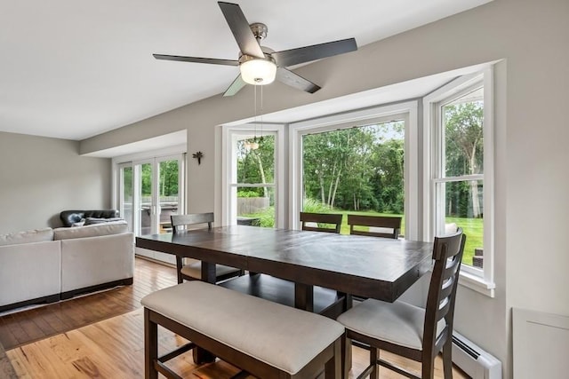 11065 Old Sound Ave, Mattituck, NY 11952 - dining area featuring a ceiling fan and light wood-style floors