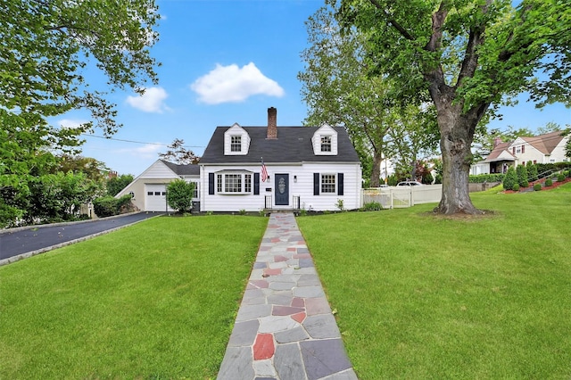 15 Benedict Ave, Eastchester, NY 10709 - cape cod home featuring a chimney and asphalt driveway
