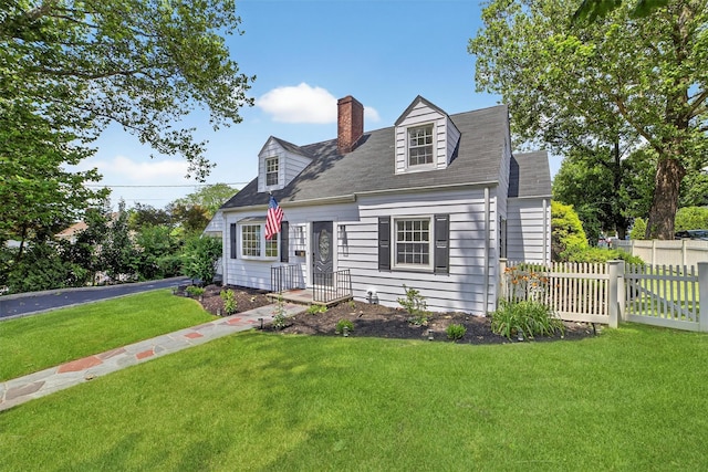 15 Benedict Ave, Eastchester, NY 10709 - cape cod home featuring a chimney and roof with shingles