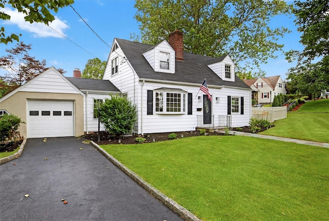 15 Benedict Ave, Eastchester, NY 10709 - cape cod-style house with a chimney, a front yard, asphalt driveway, an attached garage, and a shingled roof