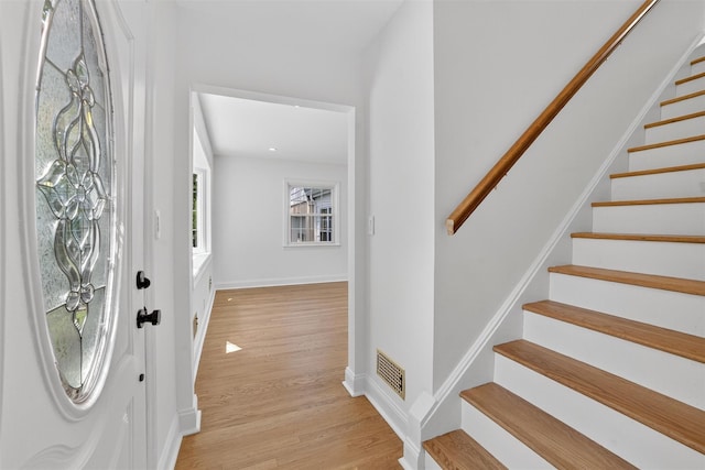 15 Benedict Ave, Eastchester, NY 10709 - entryway featuring stairway and light wood-style flooring