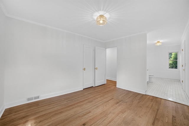 15 Benedict Ave, Eastchester, NY 10709 - unfurnished room with crown molding and light wood-style floors