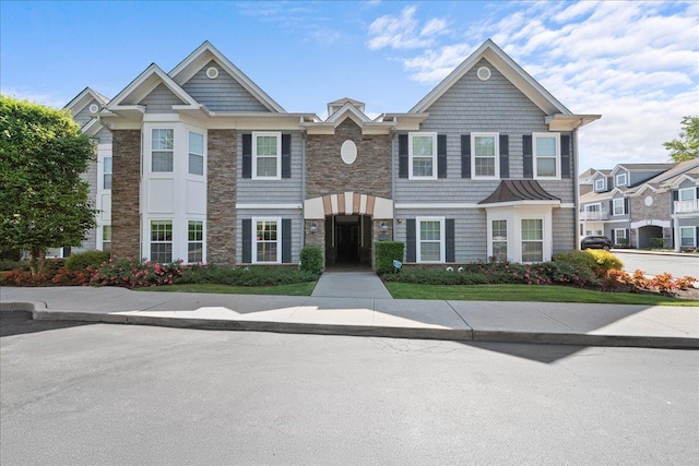 13 Nicole Ct, Copiague, NY 11726 - townhome / multi-family property with stone siding