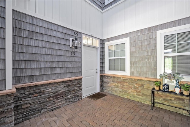 13 Nicole Ct, Copiague, NY 11726 - view of exterior entry featuring stone siding