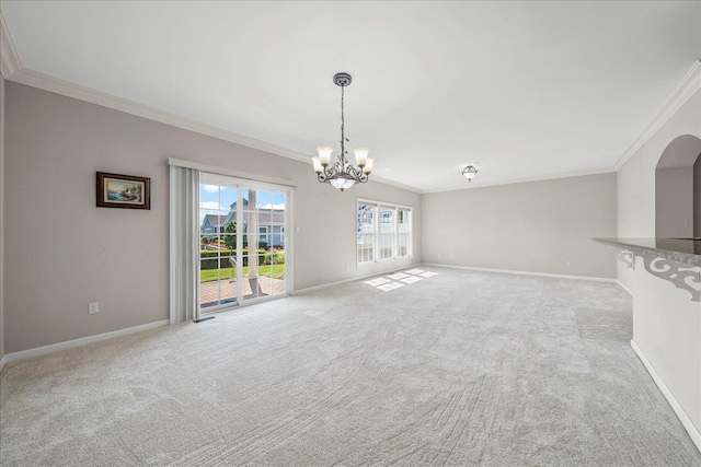 13 Nicole Ct, Copiague, NY 11726 - unfurnished living room featuring ornamental molding, carpet flooring, a chandelier, and arched walkways