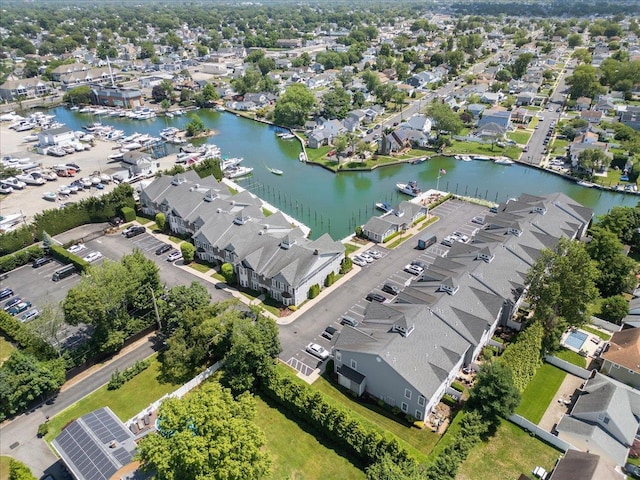 13 Nicole Ct, Copiague, NY 11726 - aerial overview of property's location with a nearby body of water and nearby suburban area