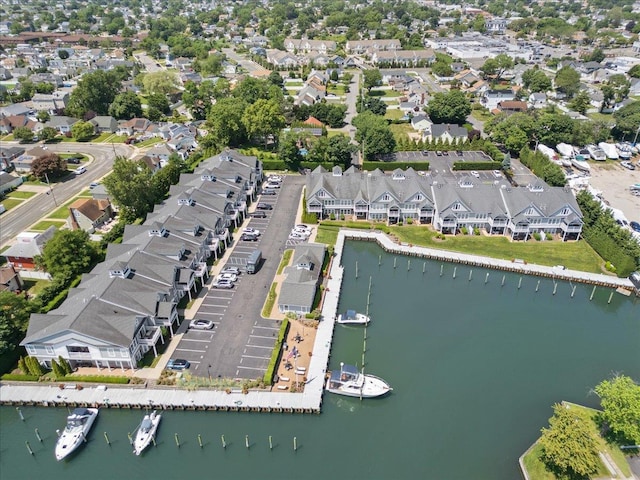 13 Nicole Ct, Copiague, NY 11726 - aerial overview of property's location with a nearby body of water and nearby suburban area