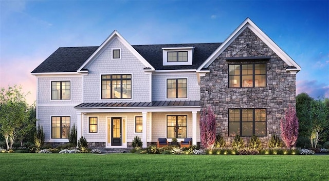 22 Sienna Ct, Dix Hills, NY 11746 - view of front of house with a standing seam roof, stone siding, and a porch