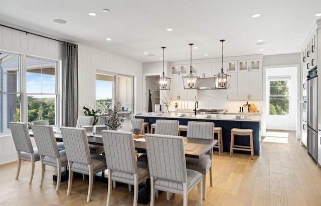 22 Sienna Ct, Dix Hills, NY 11746 - dining space with light wood-style floors and recessed lighting