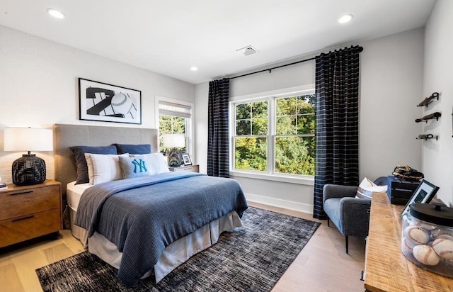 22 Sienna Ct, Dix Hills, NY 11746 - bedroom with recessed lighting and light wood-style flooring