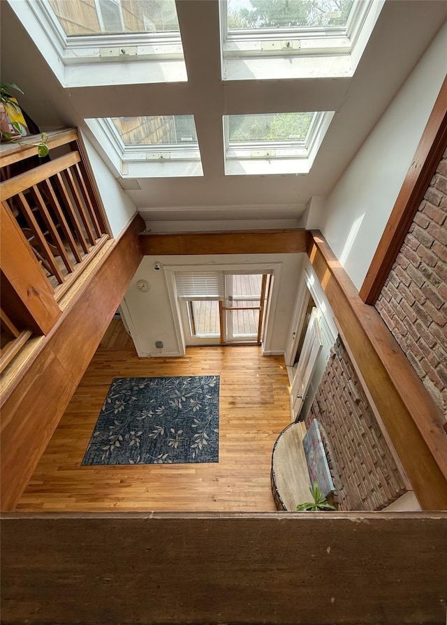 1144 N Ave, New Rochelle, NY 10804 - stairway featuring a skylight and wood finished floors