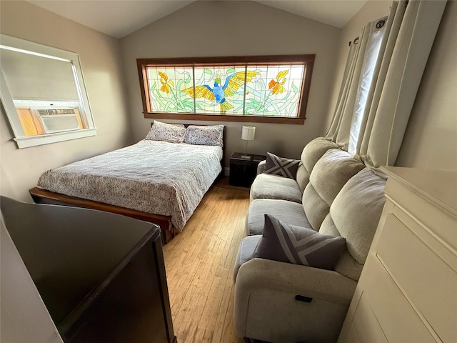 1144 N Ave, New Rochelle, NY 10804 - bedroom featuring light wood-style floors, vaulted ceiling, and cooling unit