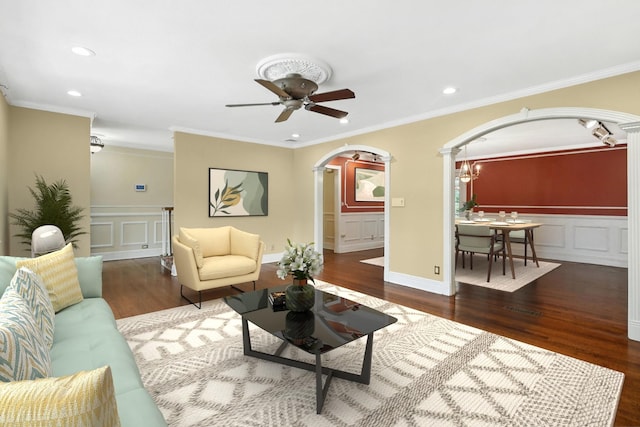 2 Ann Pl, Valhalla, NY 10595 - living room with arched walkways, wood finished floors, a decorative wall, wainscoting, and a ceiling fan