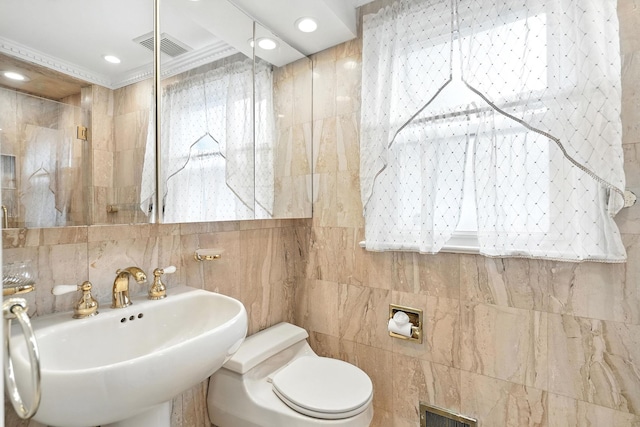 2 Ann Pl, Valhalla, NY 10595 - bathroom featuring tile walls, recessed lighting, and decorative backsplash