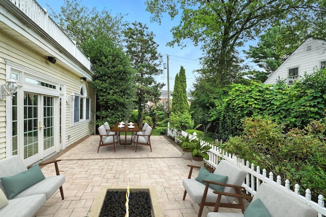 2 Ann Pl, Valhalla, NY 10595 - view of patio / terrace featuring outdoor dining area, french doors, and an outdoor fire pit