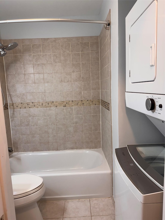 21 Lexington Hl Unit 8, Harriman, NY 10926 - bathroom with stacked washer / drying machine, tile patterned flooring, and shower / bath combination