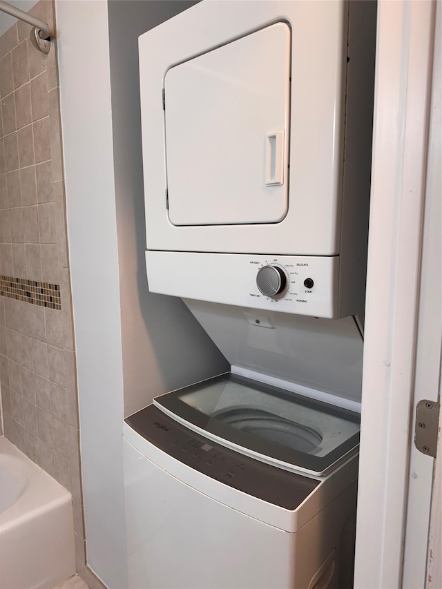 21 Lexington Hl Unit 8, Harriman, NY 10926 - laundry room featuring stacked washer and clothes dryer