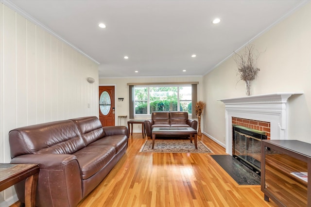 18 Gainsboro Ln, Syosset, NY 11791 - living room with light wood finished floors, ornamental molding, a brick fireplace, and recessed lighting