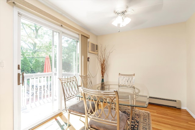 18 Gainsboro Ln, Syosset, NY 11791 - dining space featuring a baseboard radiator, healthy amount of natural light, ceiling fan, and light wood-type flooring
