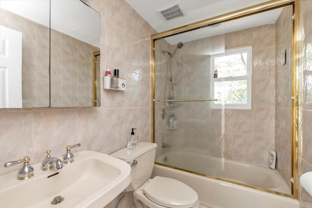 18 Gainsboro Ln, Syosset, NY 11791 - bathroom with tile walls, combined bath / shower with glass door, and decorative backsplash