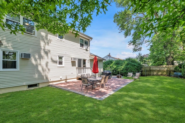 18 Gainsboro Ln, Syosset, NY 11791 - rear view of house featuring a patio and a wall unit AC